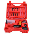 Red brake bleeder vacuum pump kit case with adapters, tubes, and gauge parts
