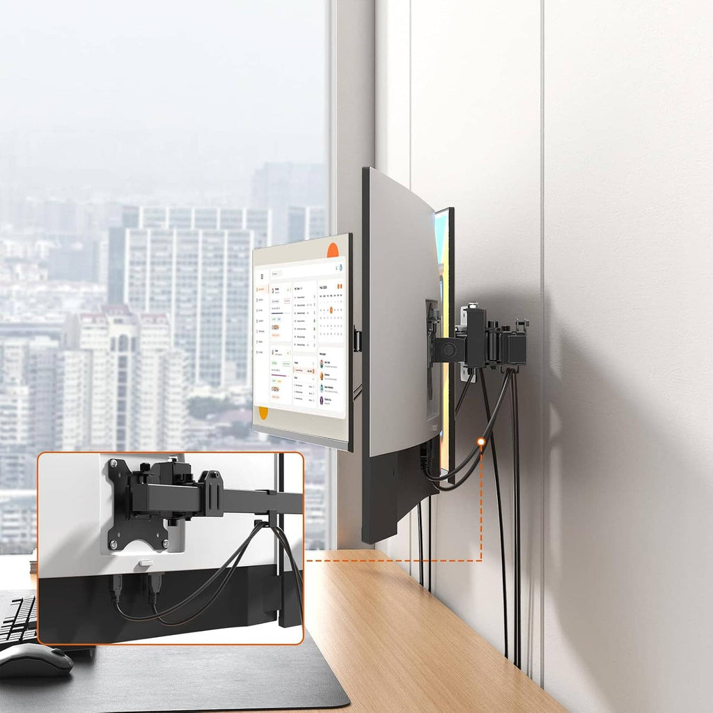 Triple monitor wall mount close-up with VESA plates and cable management on the bracket