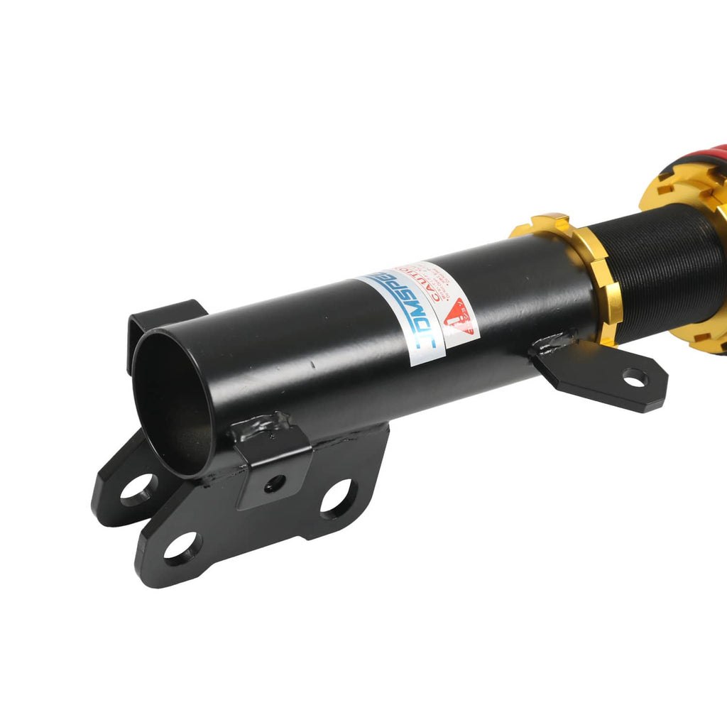 Coilover strut: black shock tube with mounting bracket, gold collar, and label stickers