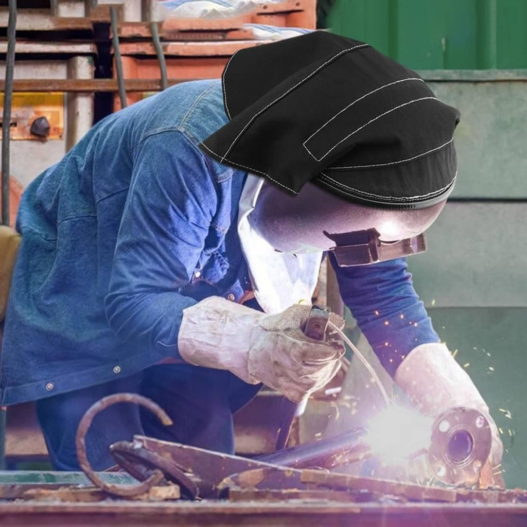 Black welding helmet cover with extended neck flap on welding helmet