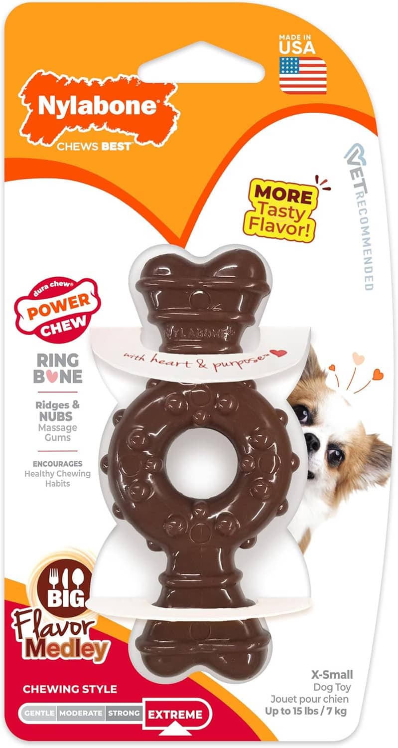 Dark brown bone-shaped ring chew toy on orange Nylabone package