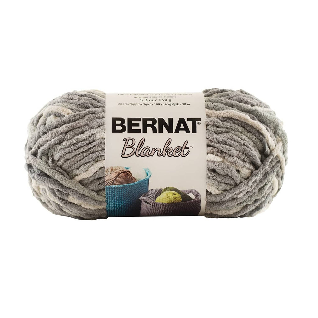 Super bulky chenille yarn skein in medium gray with variegated striping