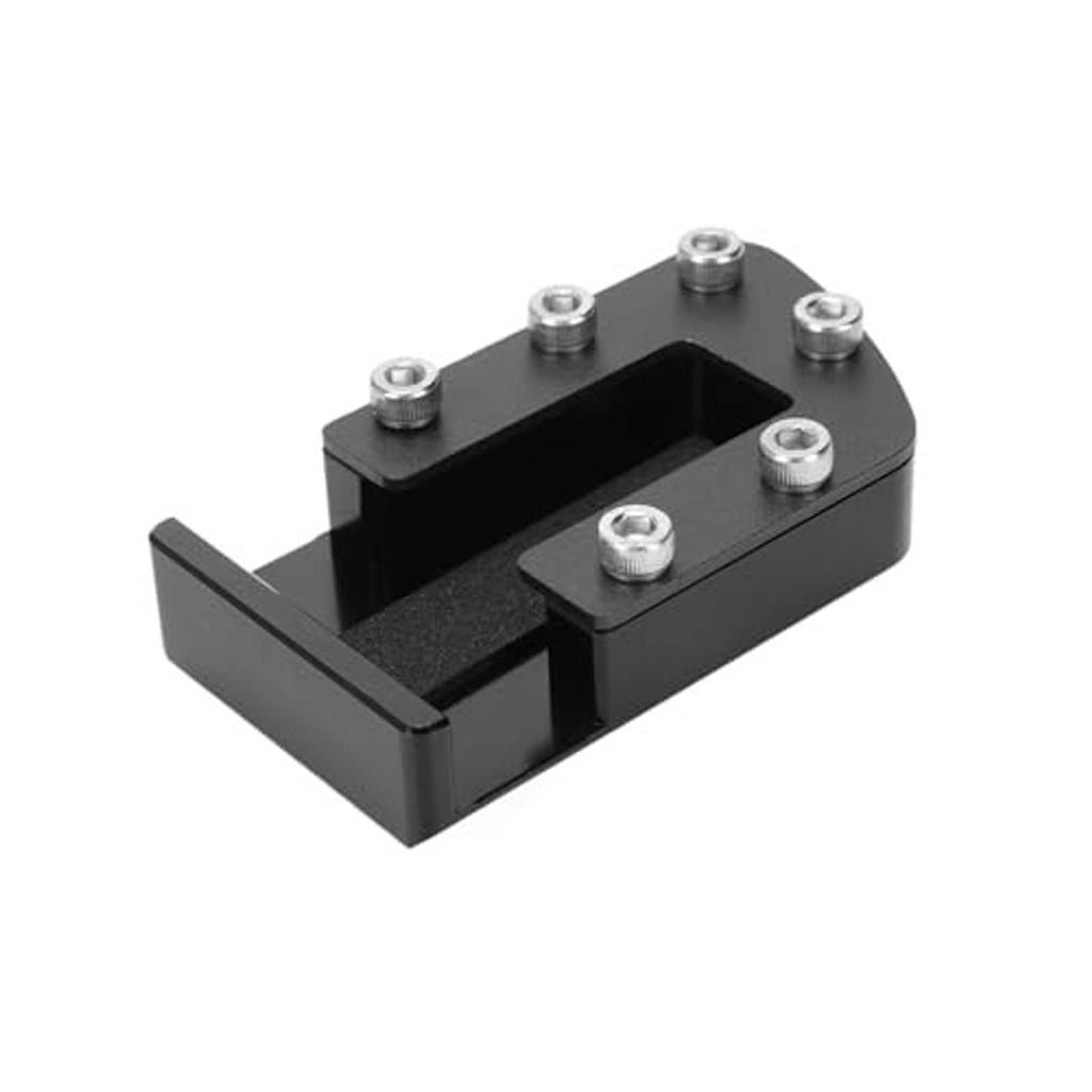 Black brake pedal pad base with textured insert and visible mounting posts