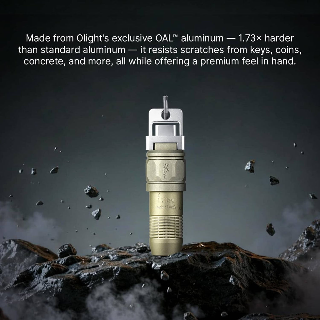 Olive green mini LED flashlight with silver loop-style base, upright