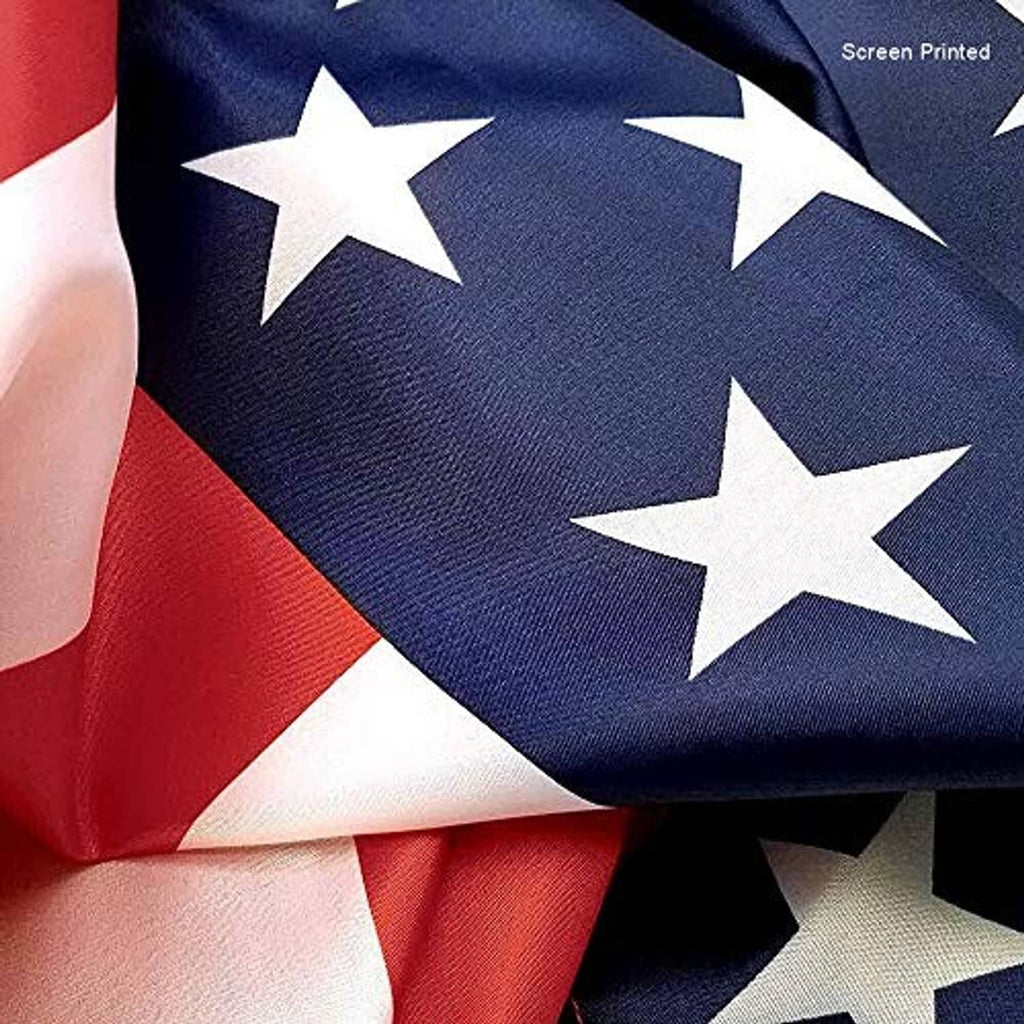Close-up American flag fabric with large white stars on navy and red stripes