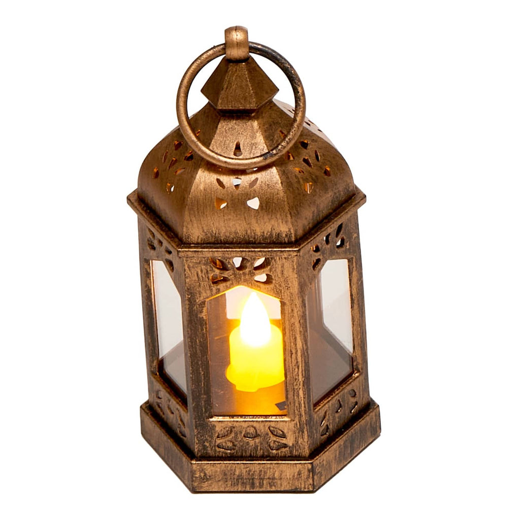 Bronze LED flameless candle lantern with glowing candle and decorative cutout pattern