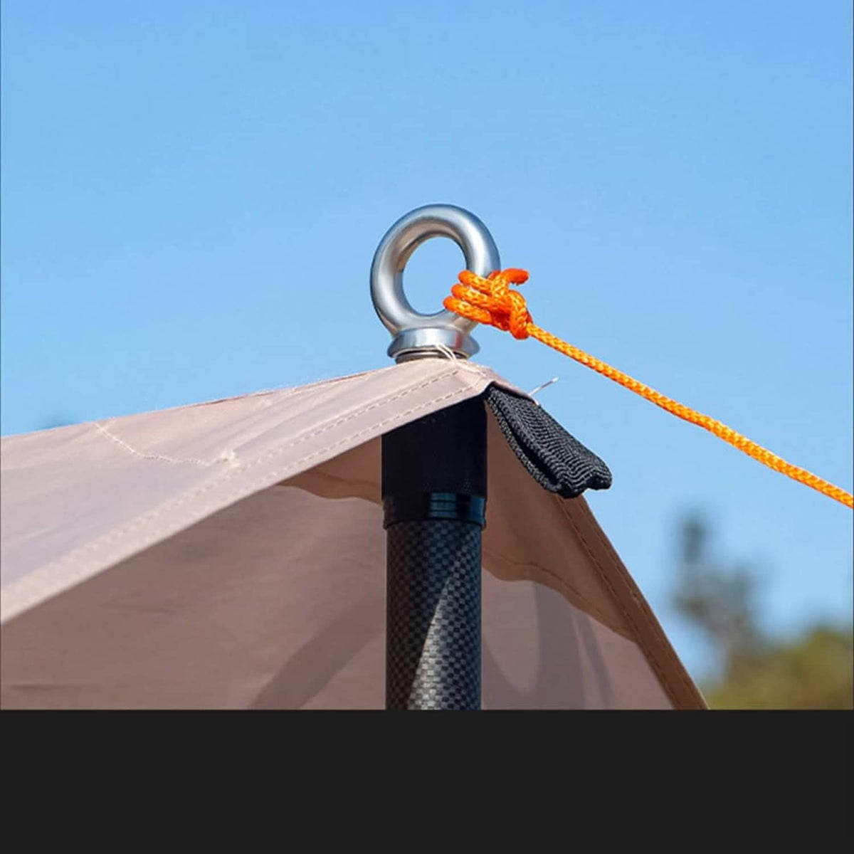 Silver lifting eye bolt on tent canopy with orange rope attached