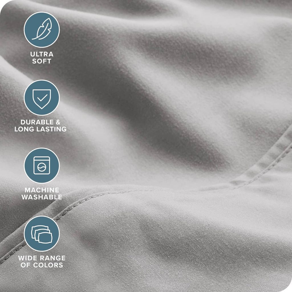 Light grey microfiber sheet fabric with stitched seams and smooth, soft texture