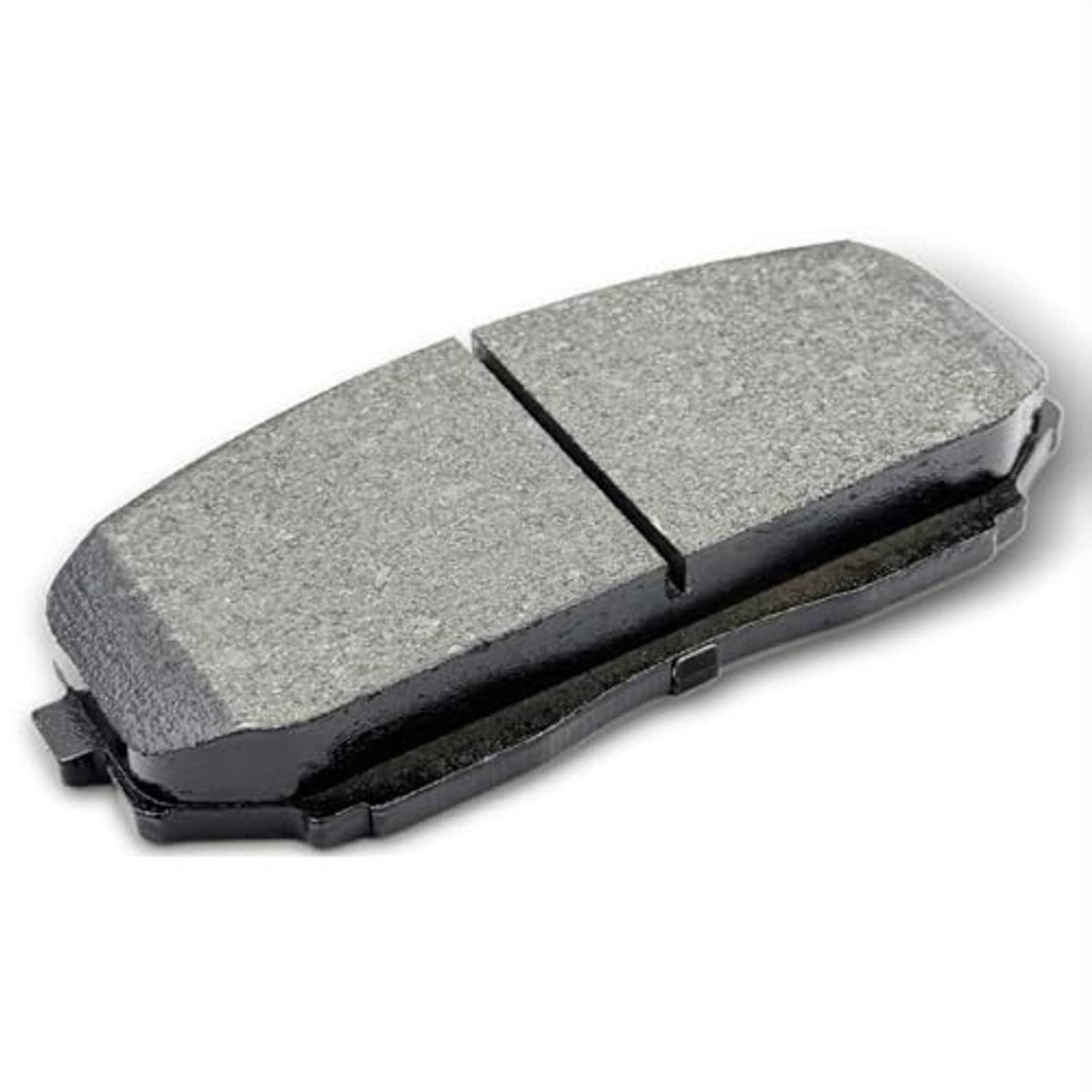 Front ceramic brake pad with gray friction surface and black backing plate, angled view