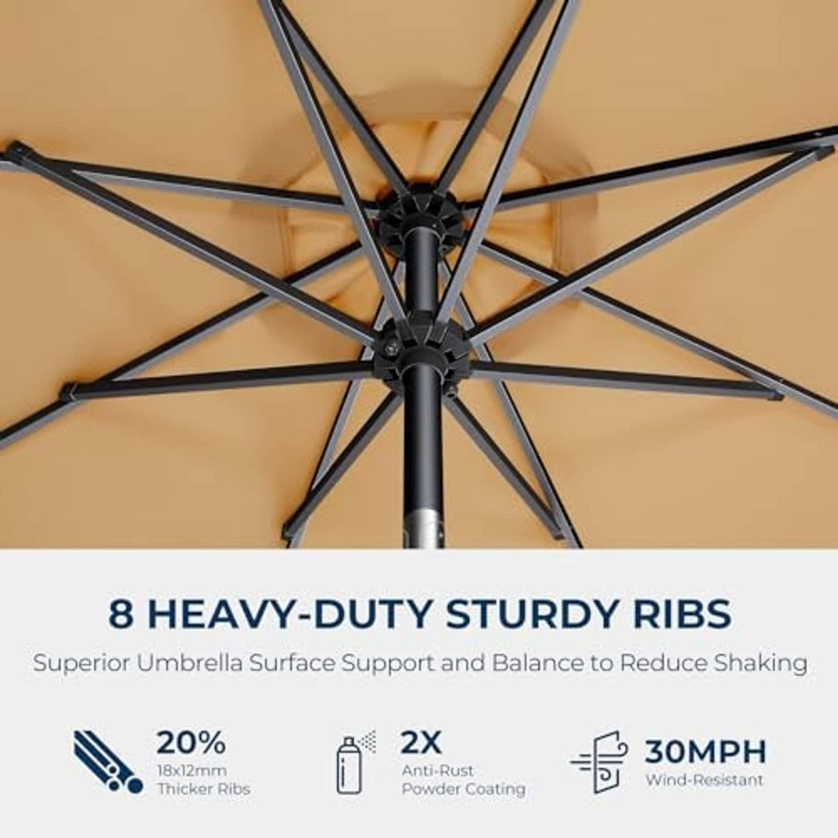 Underside view of beige umbrella canopy with reinforced ribs and central pole