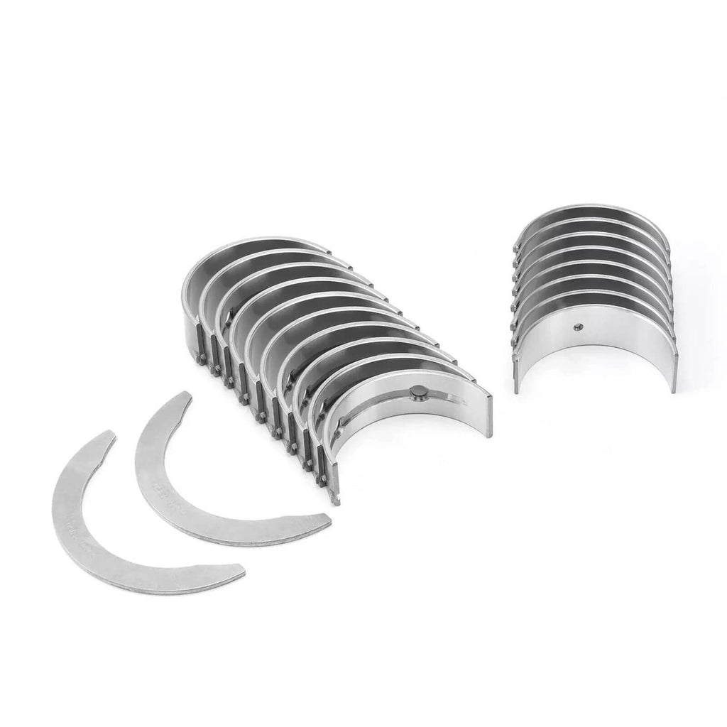 Crankshaft bearing shells with thrust half-moon pieces, silver metal