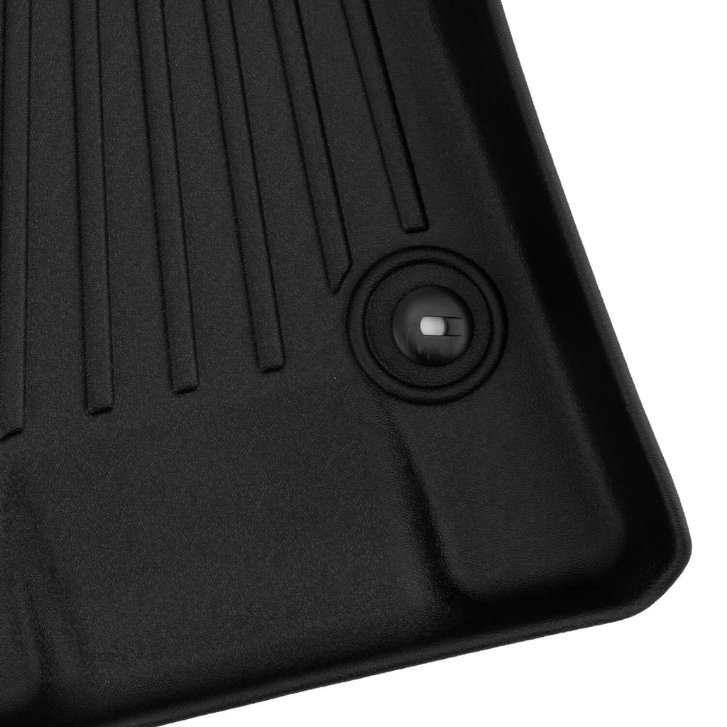 Black floor mat with circular anchor hole on raised ridges