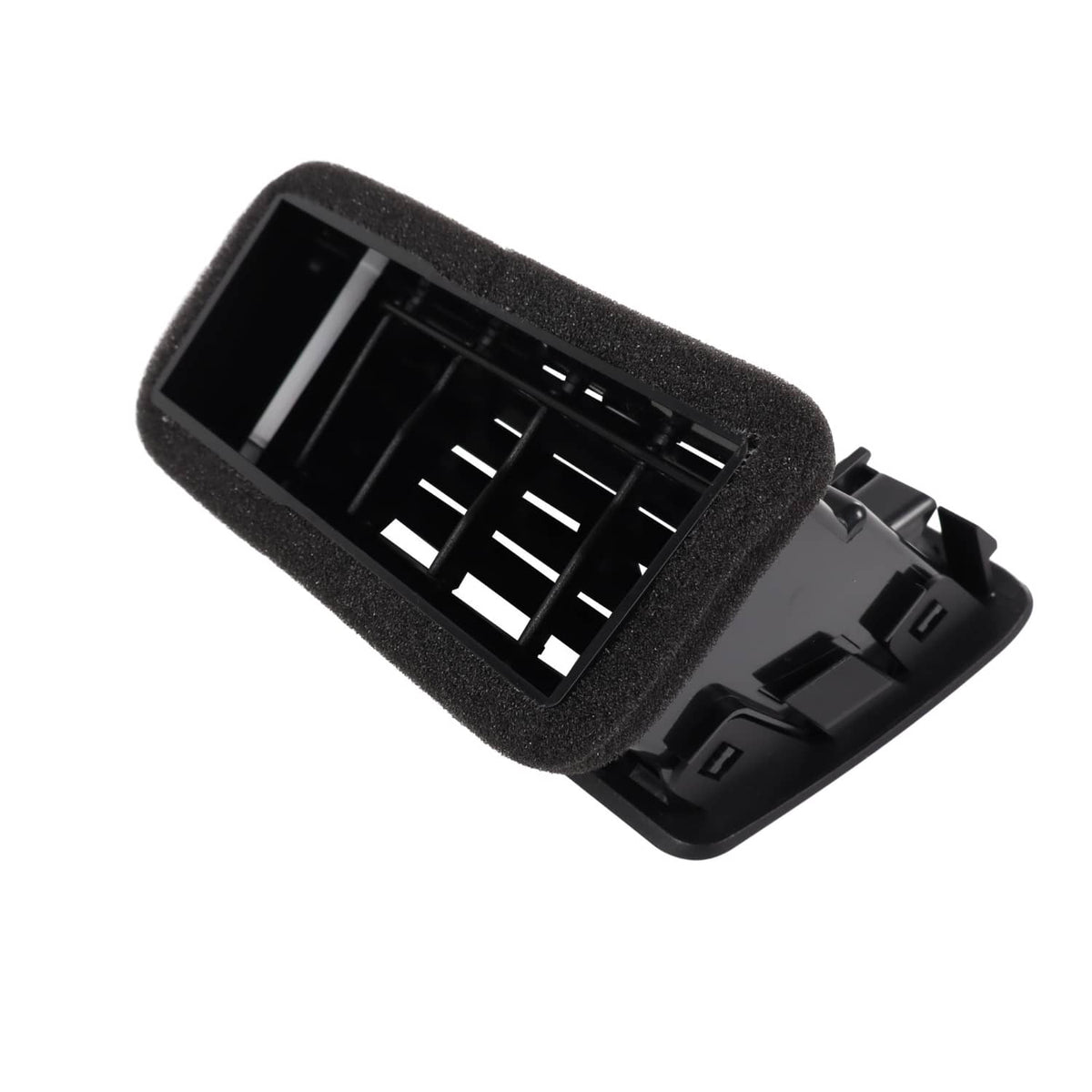 Dashboard A/C air vent grille, angled front with louver channels and foam edge.