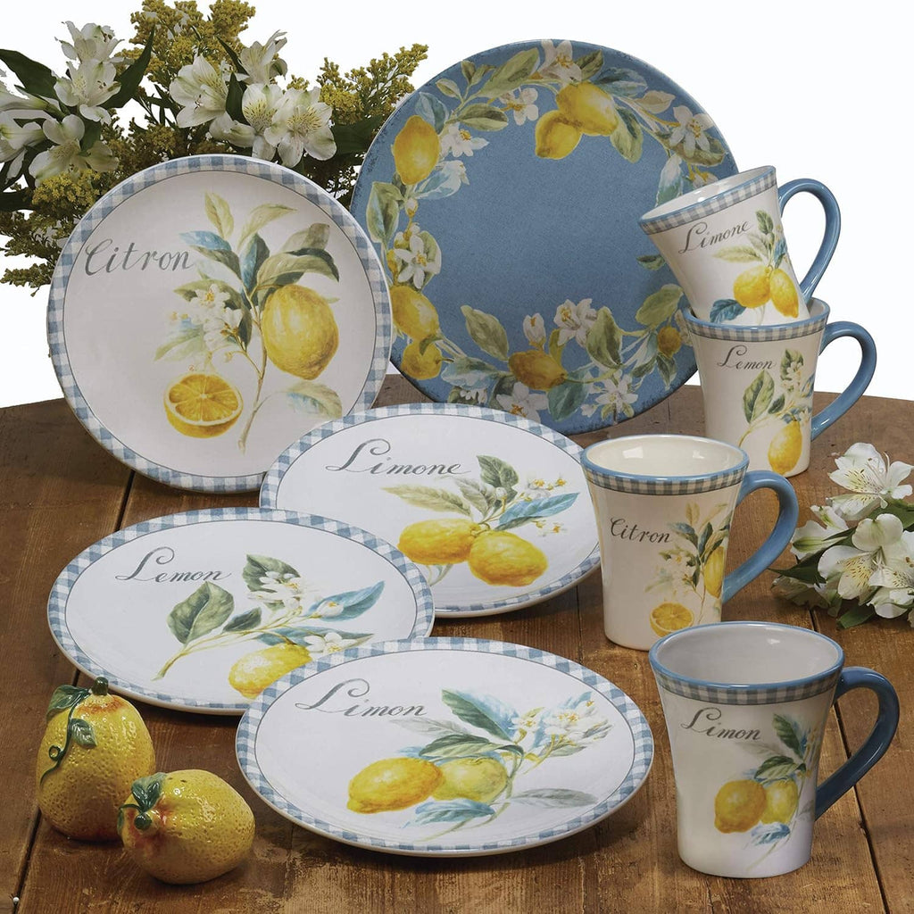 Set of lemon-pattern dinnerware with matching blue-and-yellow Citron plates and mugs