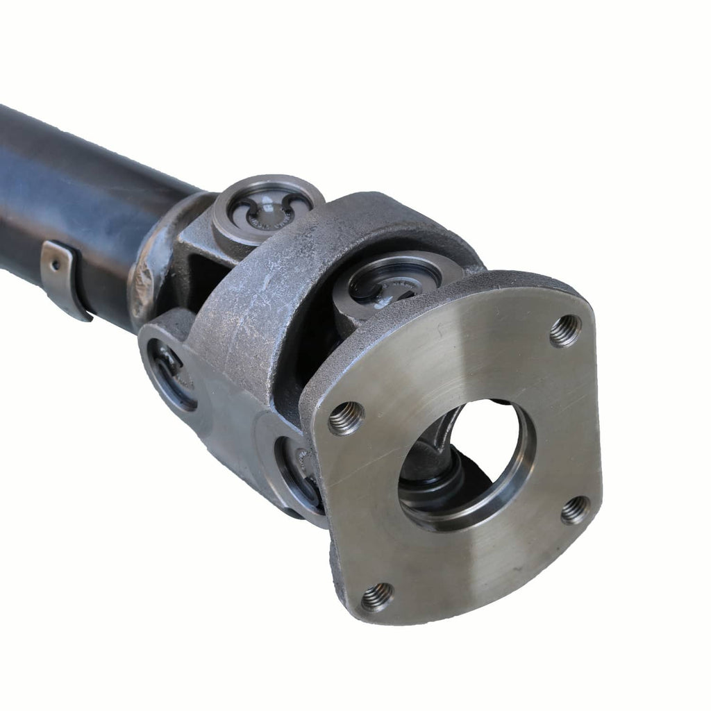 Front drive shaft flange yoke with four-bolt mounting holes and U-joint end