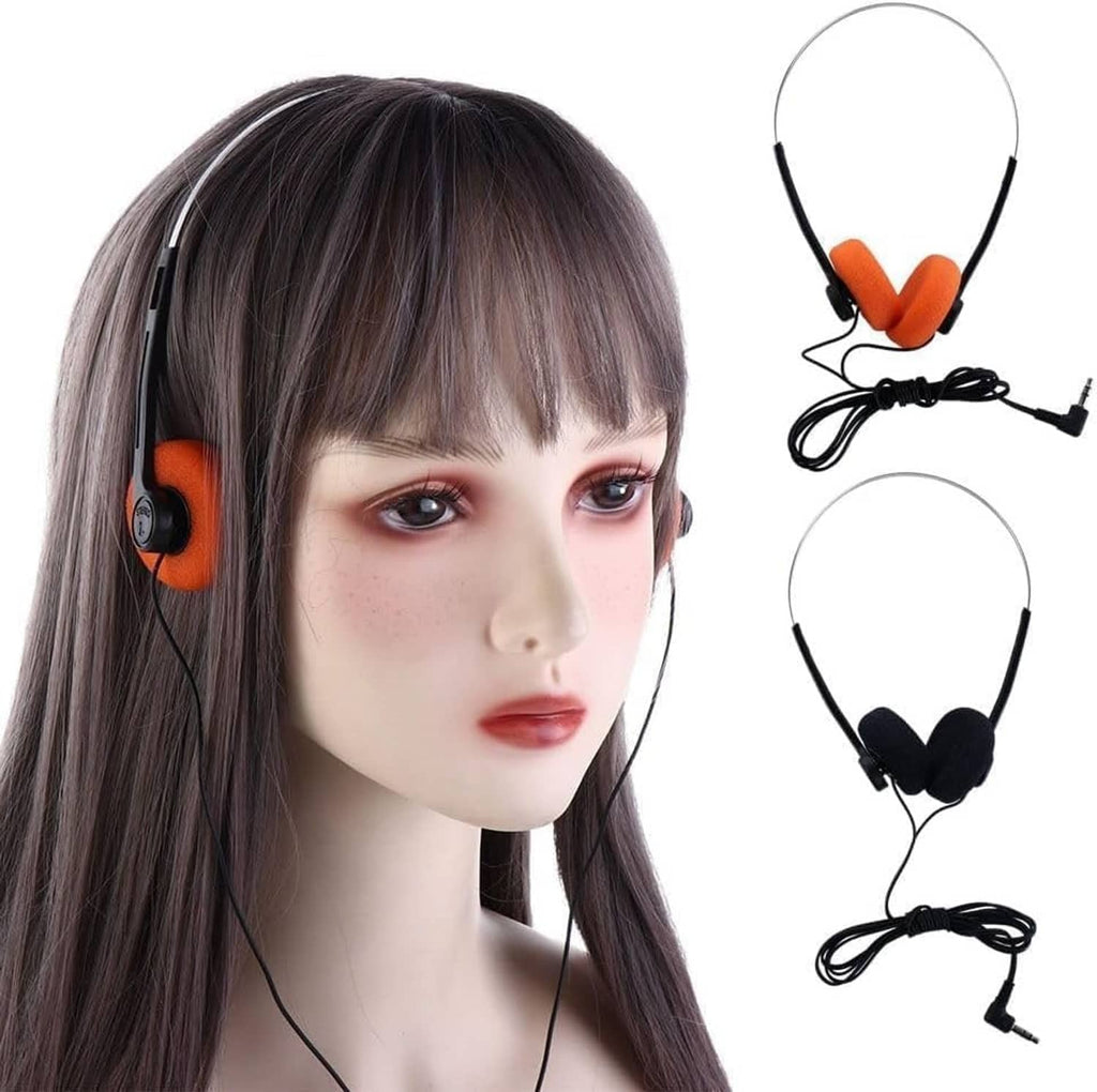 Wired retro on-ear headphones with orange ear pads and black headband, worn close-up