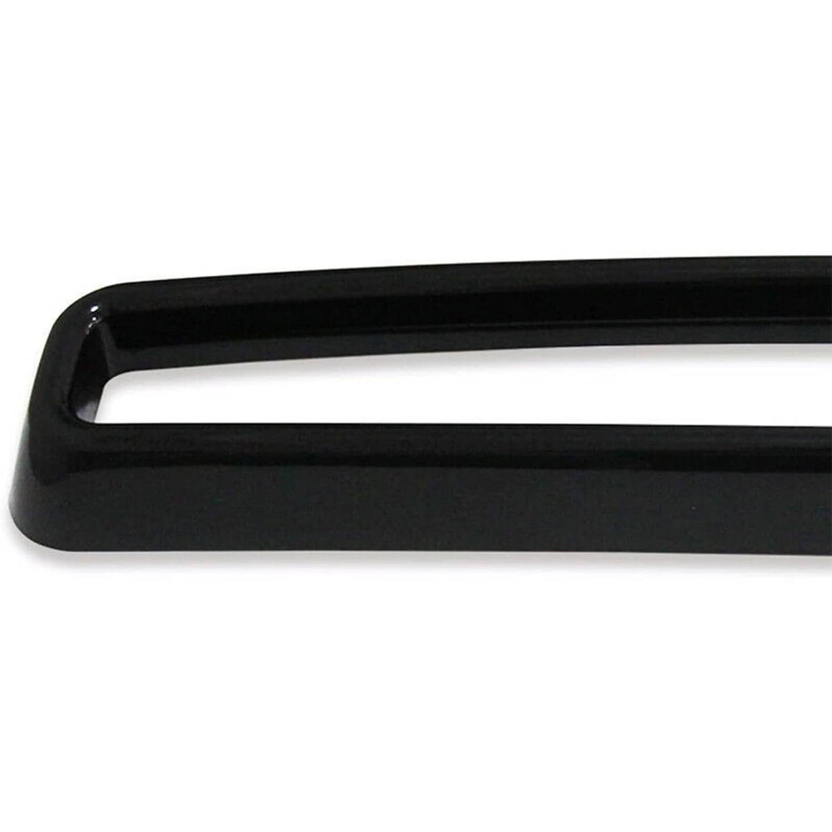 Black grille insert trim bar with long rectangular opening, smooth surround
