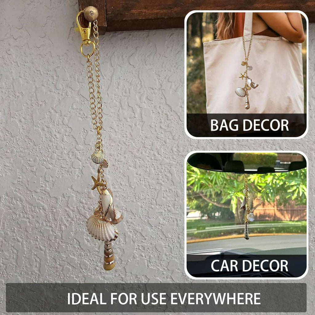 Gold sea shell charm with starfish, shell pendants, and crystal beads hanging from chain