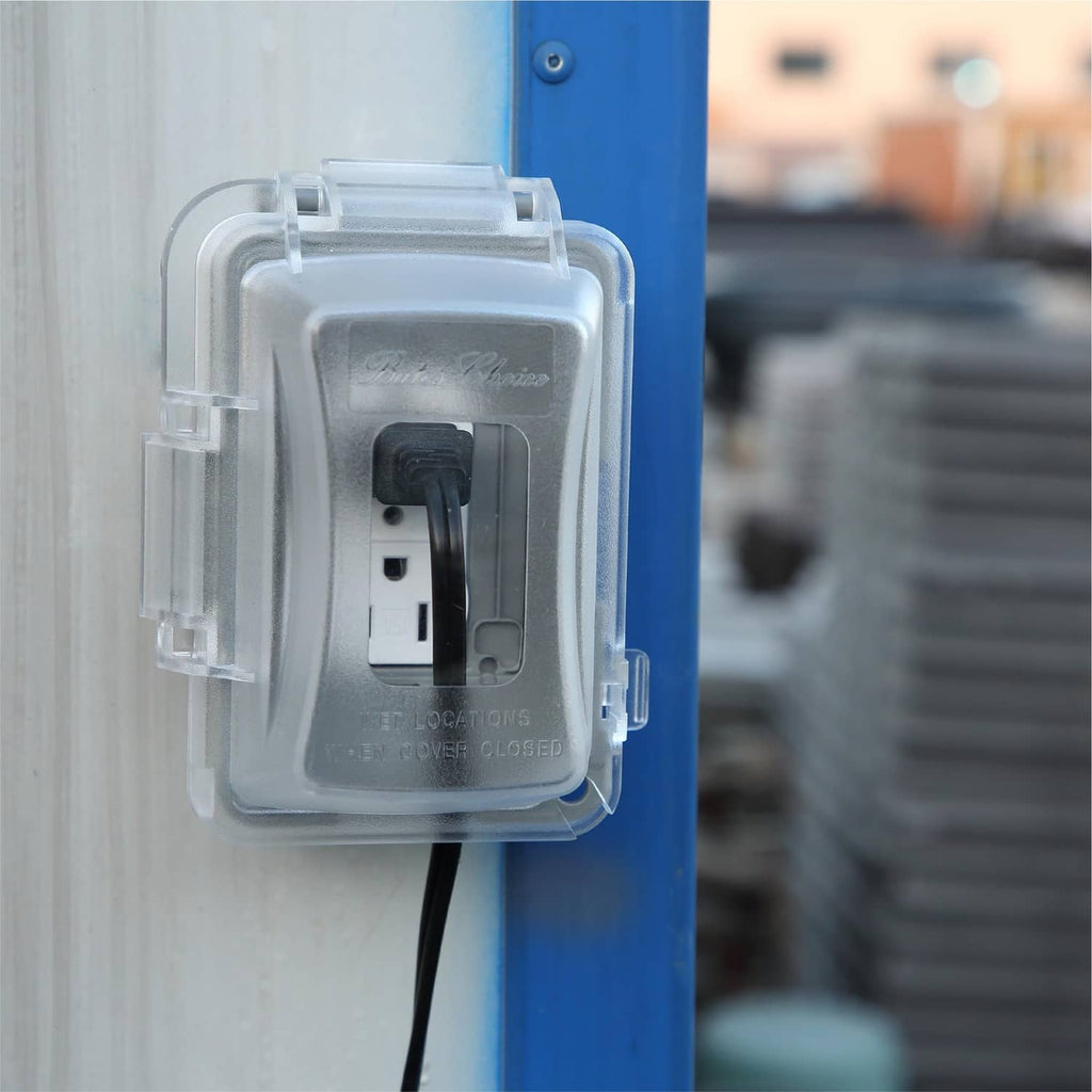 Clear 1-gang outdoor outlet cover installed on wall with transparent hinged lid