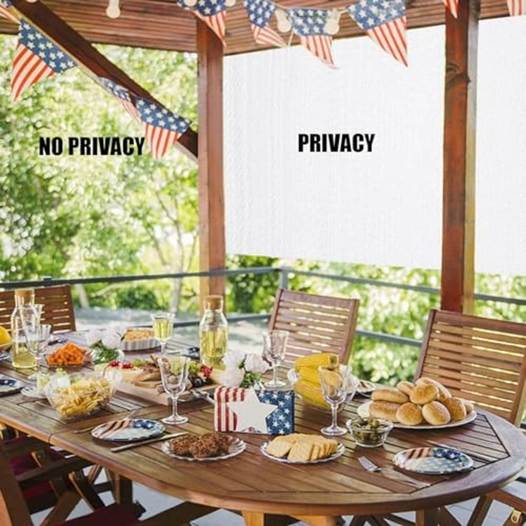 White shade cloth panels mounted on outdoor structure, creating privacy coverage