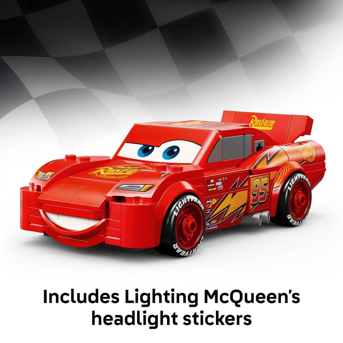 Red buildable race car toy with Lightning McQueen-style face and number 95, 3/4 view