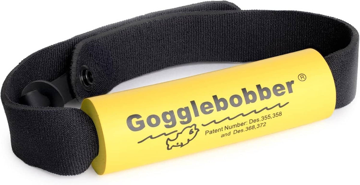 Close-up of black elastic retainer strap with yellow floating foam block label