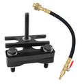 Engine valve spring compressor tool with black air hose and brass fittings