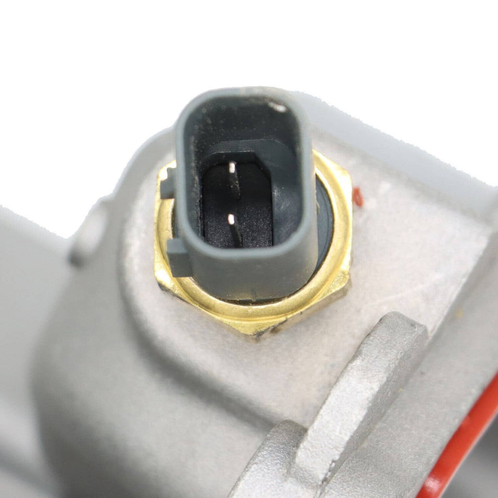 Water pump with sensor connector, close-up of sensor plug and brass contact