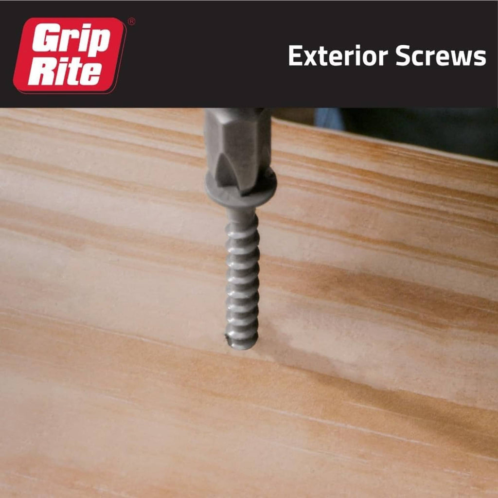 Gray exterior screw driven into light wood, #2 Phillips head visible.