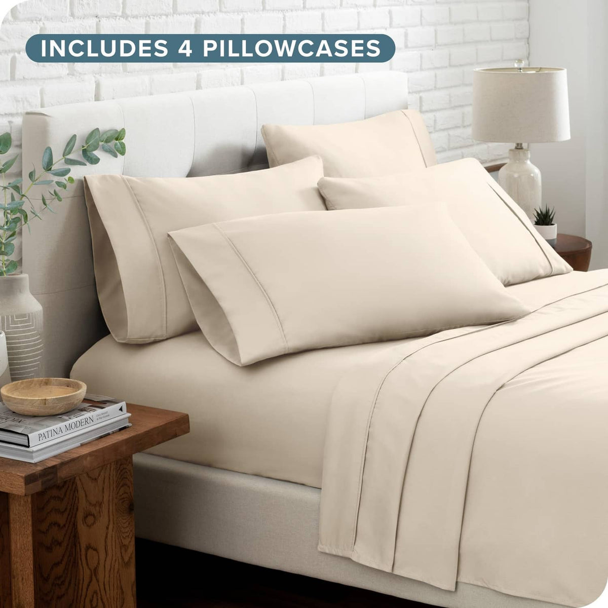 Cream sheet set with four pillowcases and flat sheet, split king bed styling