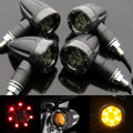 Set of 4 motorcycle LED turn signal indicators with black housings and clear lens bulbs