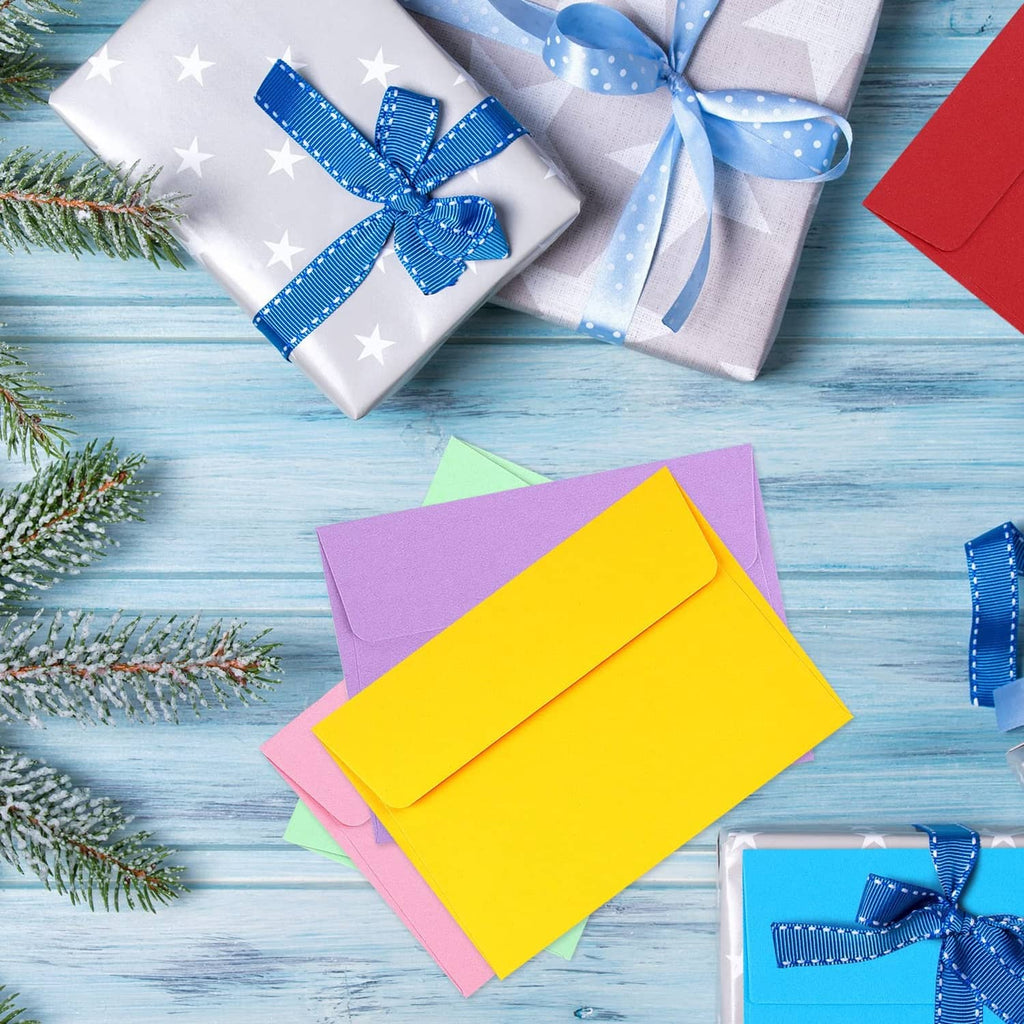 Colorful A2 envelopes with flaps, assorted tones including blue, yellow, pink
