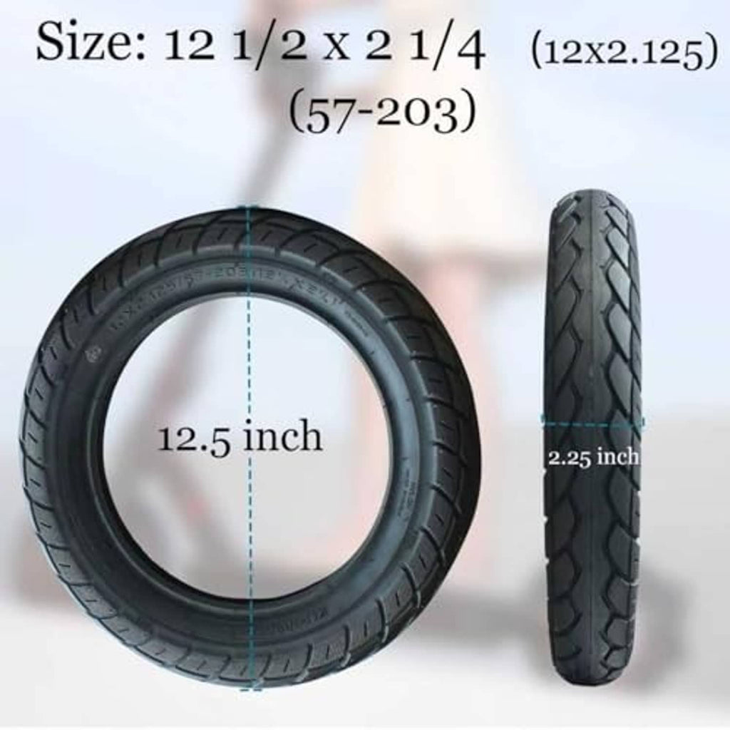 12.5 inch x 2 1/4 black tire with thick tread pattern