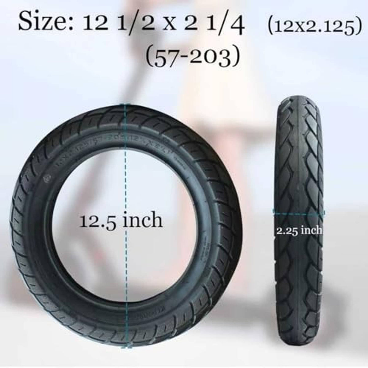 12.5 inch x 2 1/4 black tire with thick tread pattern