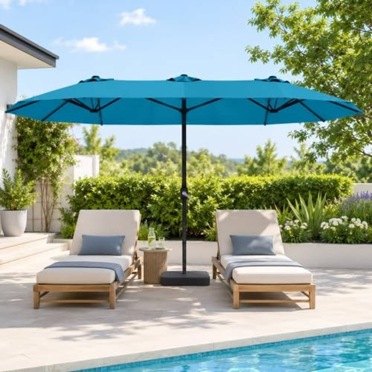 15ft teal patio umbrella with double canopy and central pole over outdoor seating area