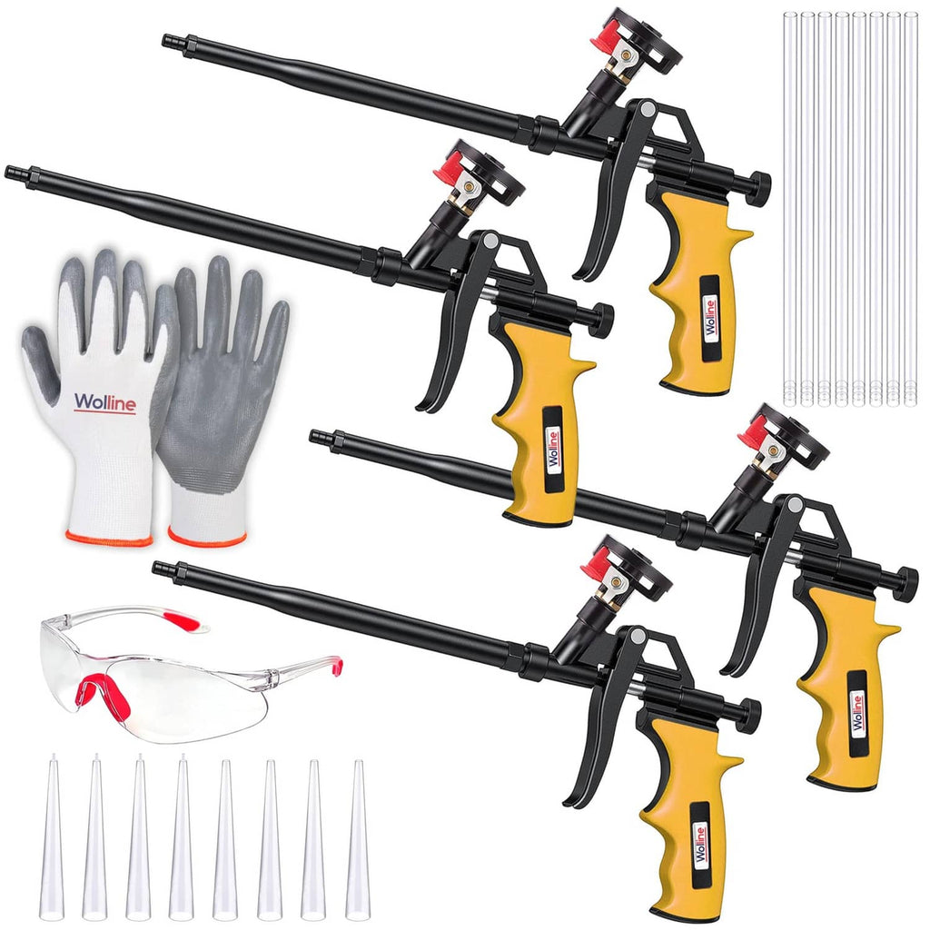 Spray foam insulation gun kit with yellow applicators, gloves, nozzles, and tube extenders