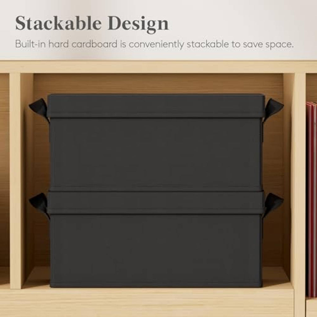 Two black stacked CD storage boxes placed on a shelf