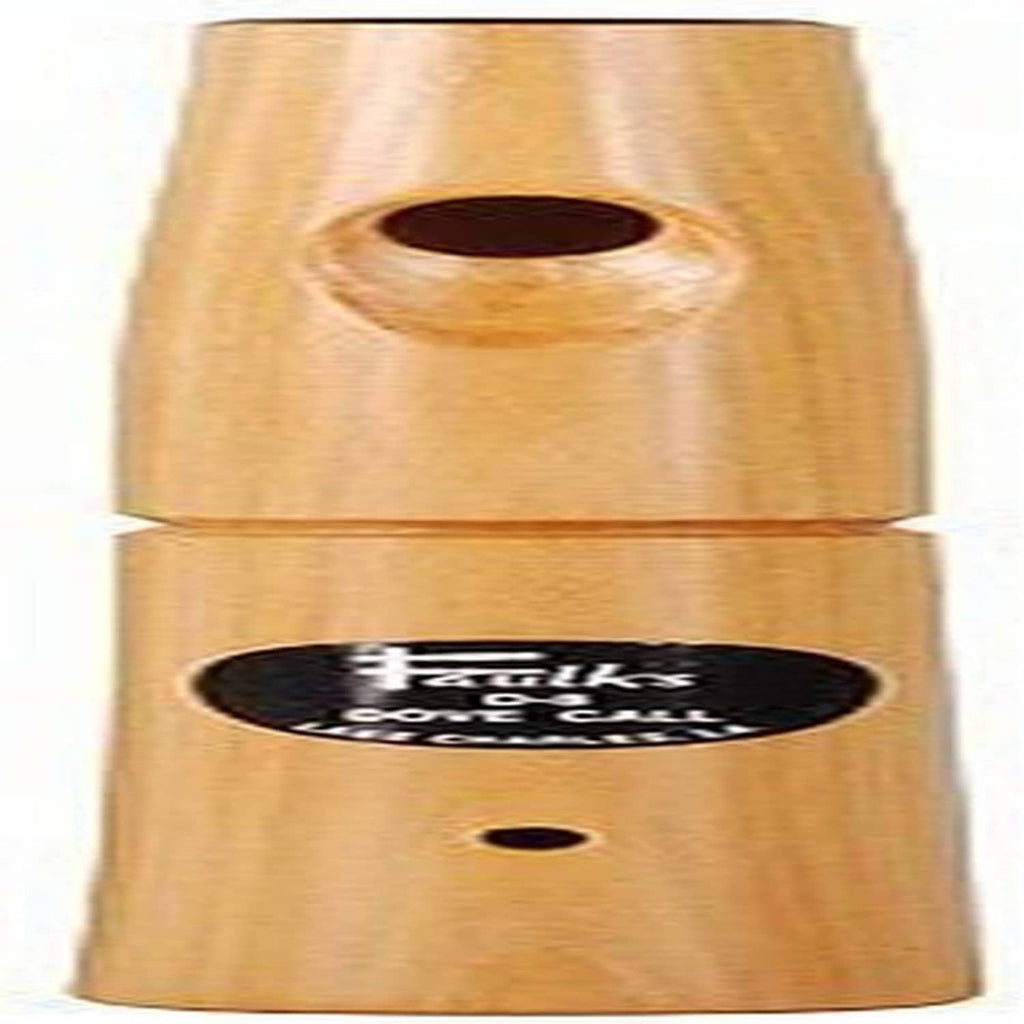 Brown paper rolls with oval openings and black label; two-piece package.