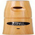 Brown paper rolls with oval openings and black label; two-piece package.