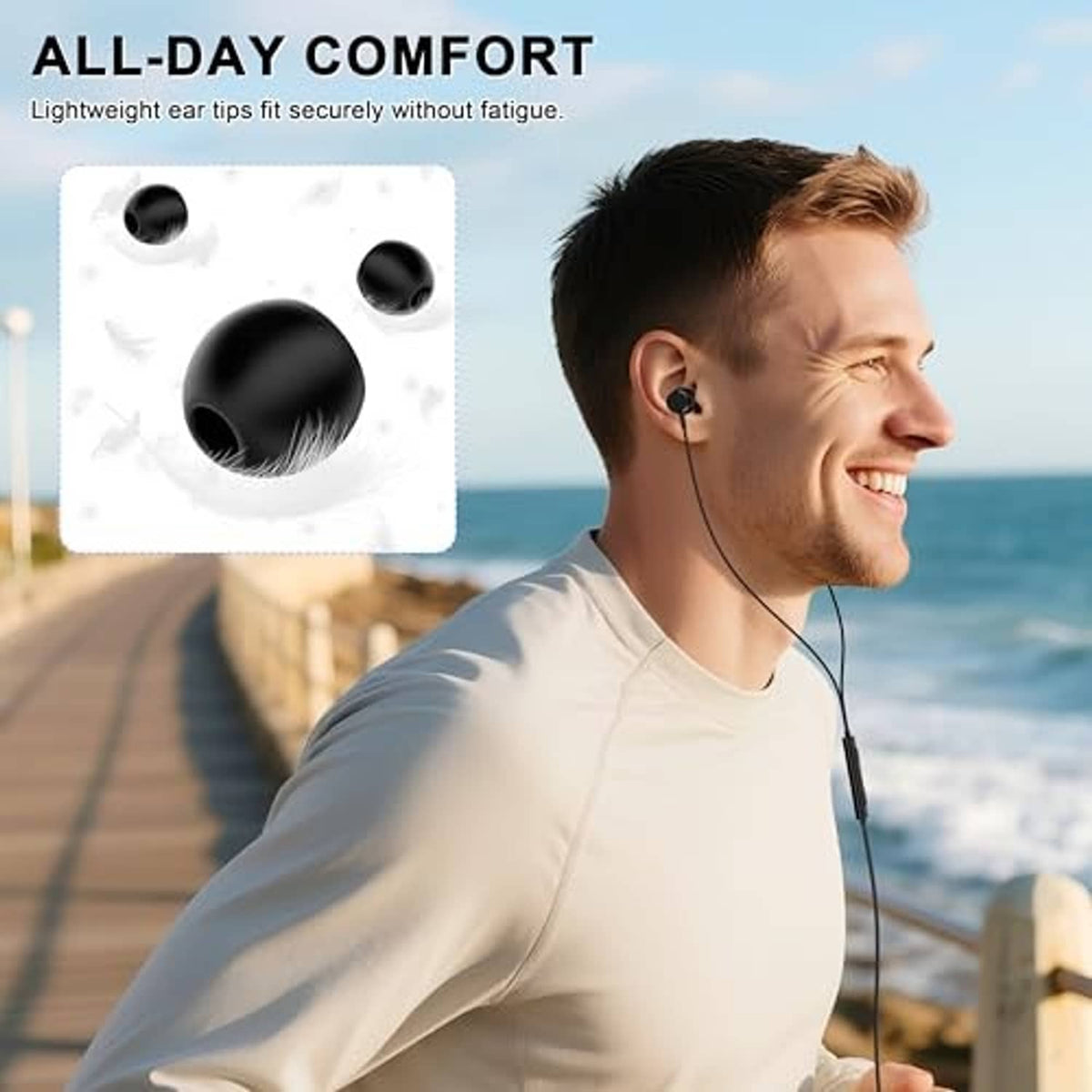 Man wearing black wired in-ear earbuds with red accents and secure ear tips
