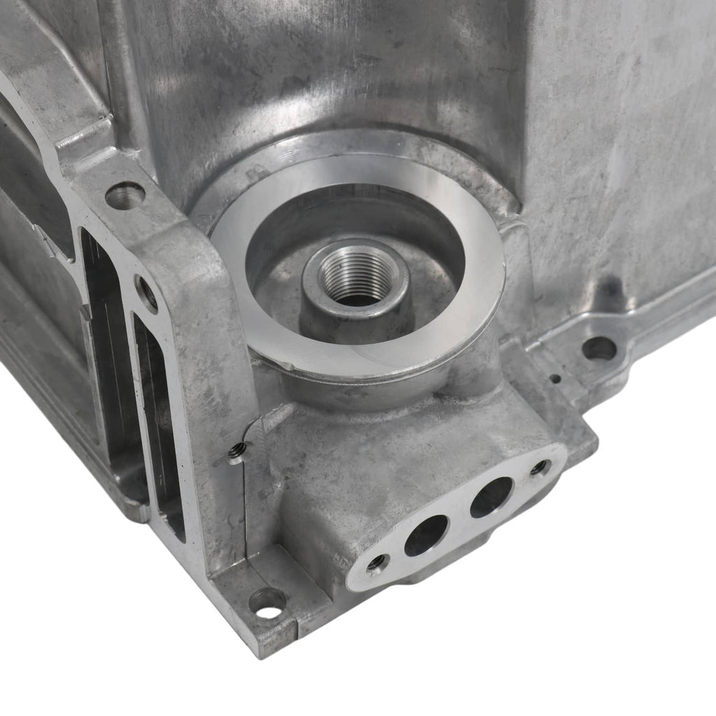 Engine oil pan threaded circular port with aluminum casting and bolt holes
