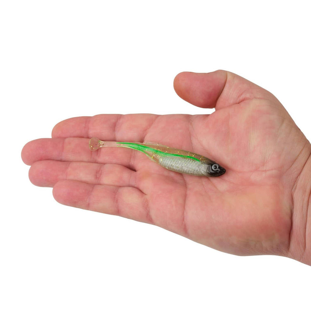 Soft fishing bait in hand: green liner drip swimmer, speckled silver and chartreuse