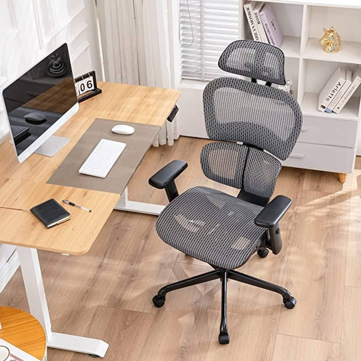Office chair with right armrest and gray upholstered seat, rolling base