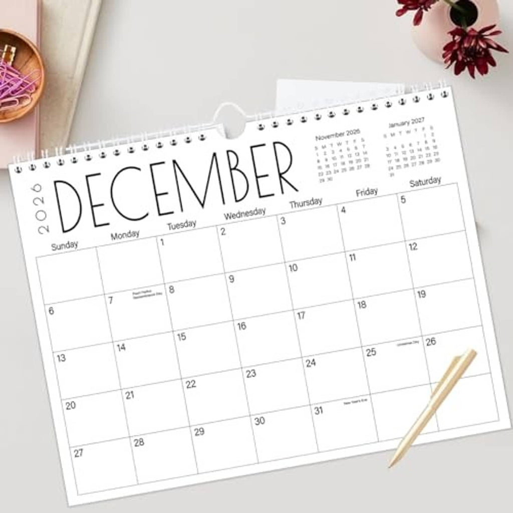 Wall calendar with spiral binding, December 2026 grid and black month title