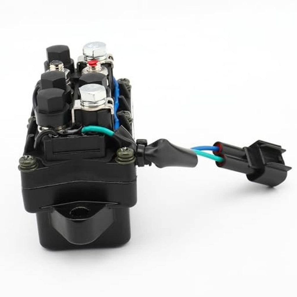 Black relay module with blue and teal wires, metal studs, and outlet connector