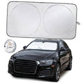 Small car windshield sun shade with two large circular panels and side tie