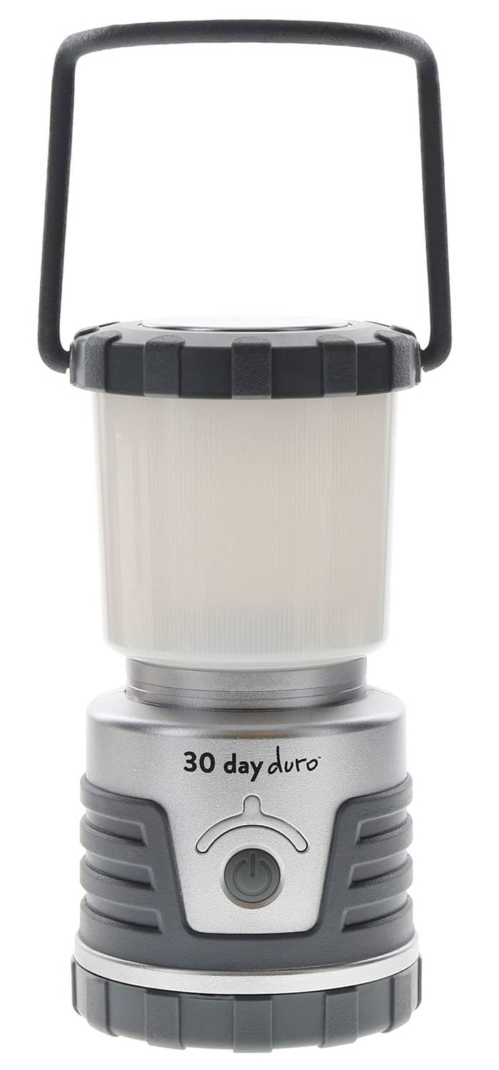 Gray lantern with white translucent body panels and top carry handle, front control dial