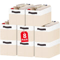 Set of eight rectangular storage baskets in white and beige with dark carry handles.