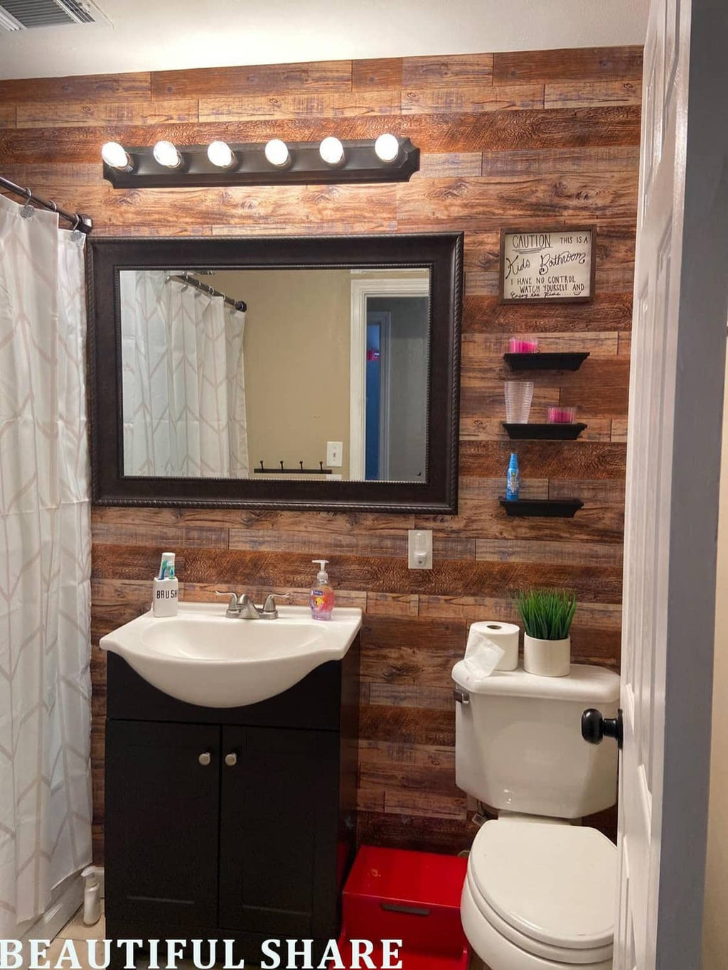 Faux wood wallpaper wall with rustic horizontal planks in a bathroom