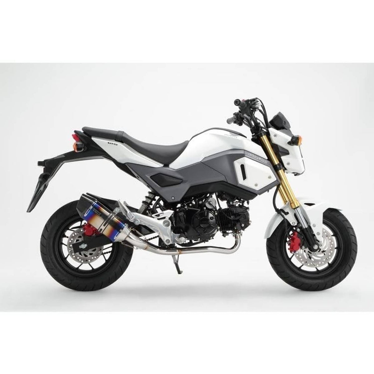 Right-side motorcycle footrest assembly on a white motorcycle